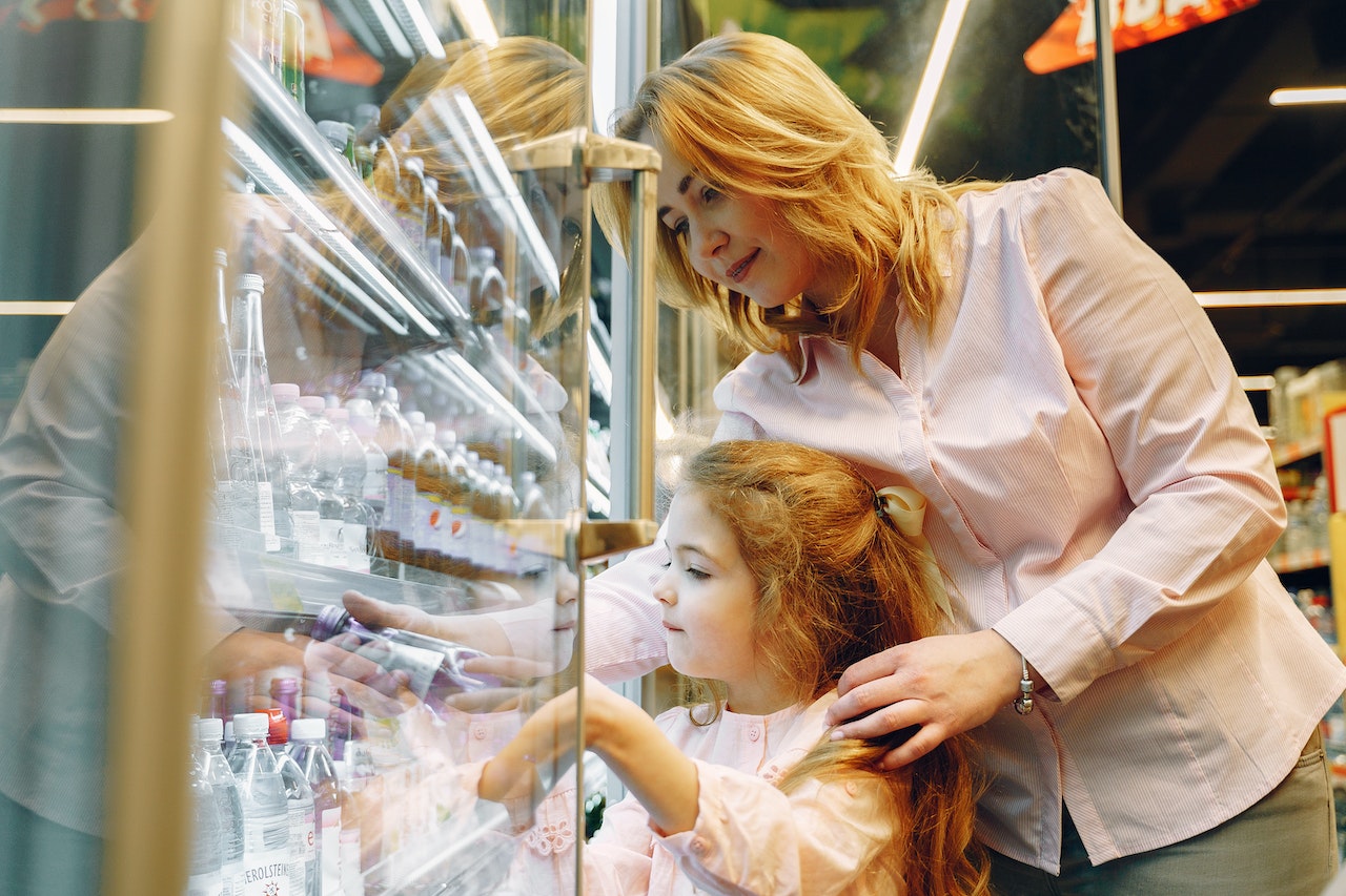 mother and daughter at the grocery